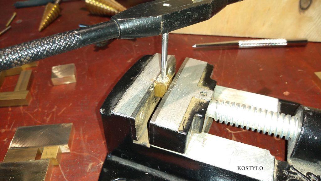 hand-threading each brass component for unique and original hinge or latch designed by the Kostylo atelier