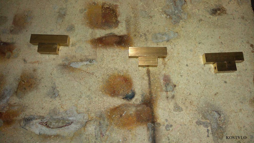 preparing the cut and fitted brass hinge components for silver soldering in the Kostylo atelier