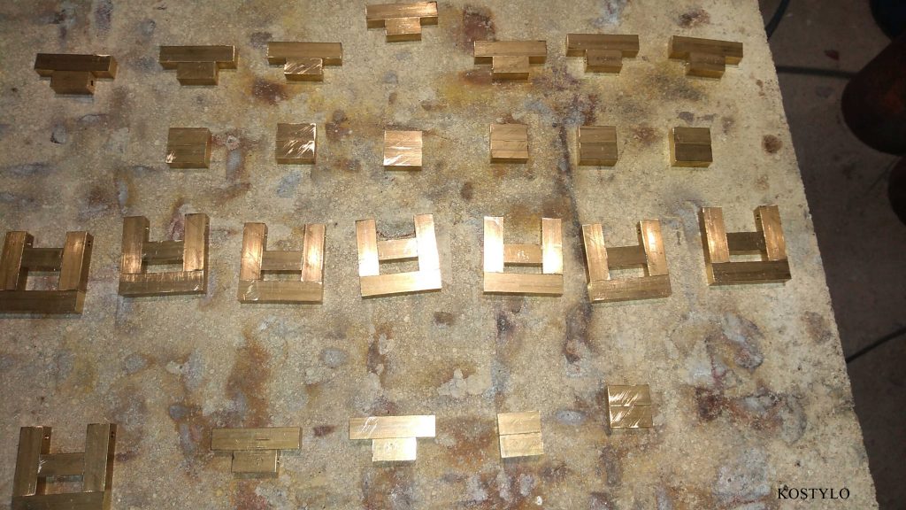 the brass components cut to size are awaiting silver soldering in the Kostylo atelier