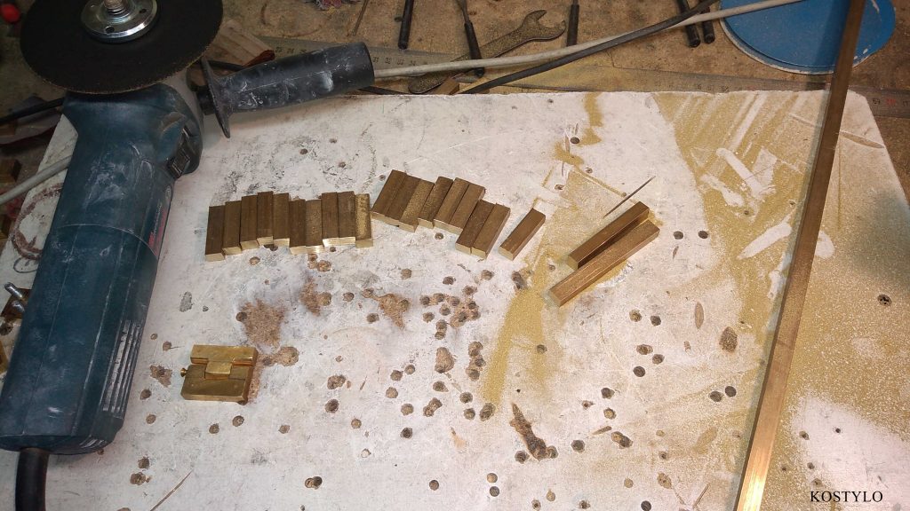 hand-cut to size the brass components for further creation of unique hinges and latches handcrafted in the Kostylo atelier