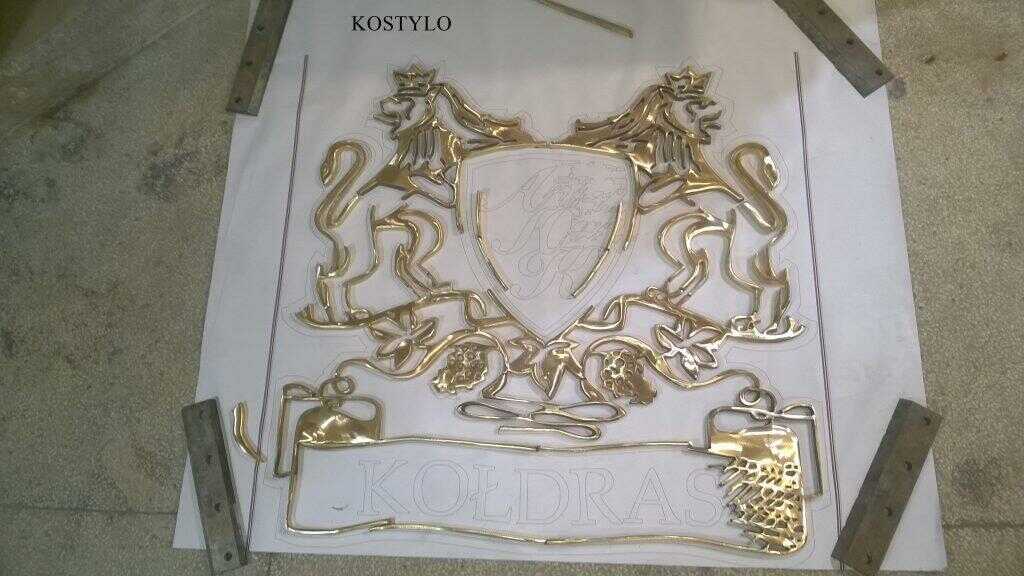 how we create hand-ground and hand-finished brass elements of an openwork bas-relief representing custom company logo which are joined together through silver soldering by Kostylo atelier