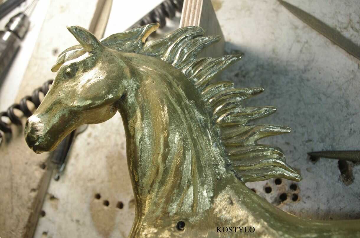the brass-cast Ferrari horse sculpture is then hand-ground and chased to accurately reproduce every detail with everything handcrafted at the Kostylo atelier