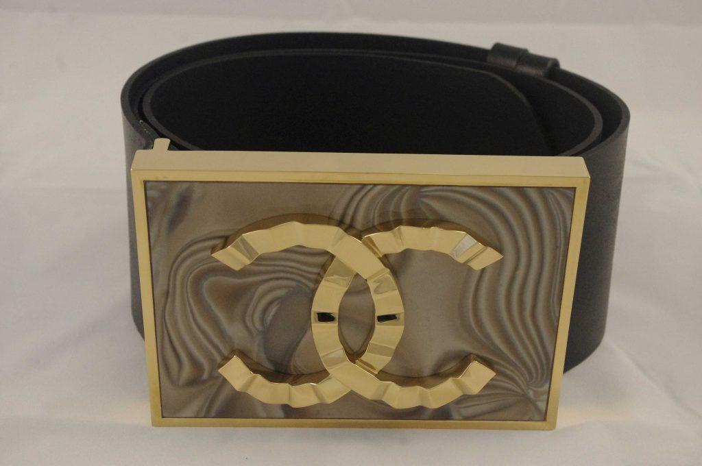 this is the final result of a brass casting featuring the Coco Chanel logo which is perfectly processed, polished, and gold-plated with 23-carat italian bright gold, finding its place in luxurious buckle for luxury dress or skirt designed by the Kostylo atelier