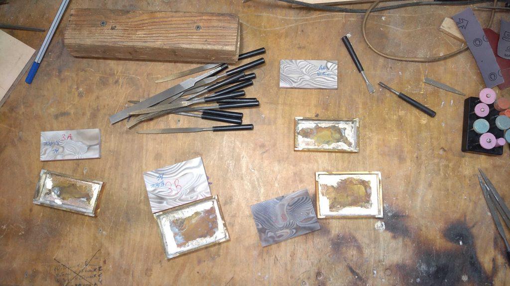 silver-soldered brass trouser buckles and fitting of unique striped flints in the Kostylo atelier