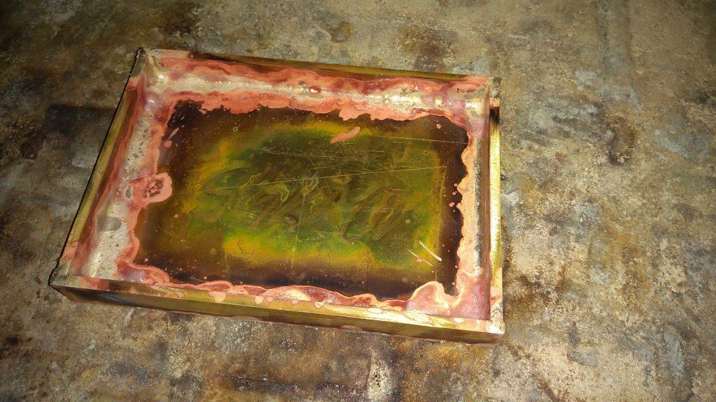 brass trouser buckle after silver soldering inside before hand grinding inside by Kostylo atelier