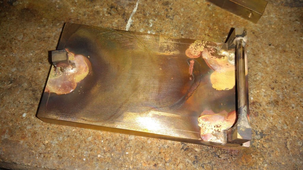 the back part of the trouser buckle is silver-soldered, the remaining elements connecting the leather belt, the next stage is manual grinding, copper-plating and gold-plating all in the Kostylo atelier