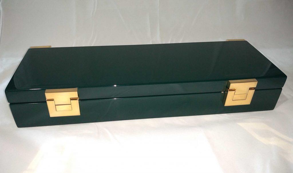 the final result of hand-crafted latches gold plated with 23-carat bright gold on luxurious company-branded box, within which are luxurious pieces created by the Kostylo atelier