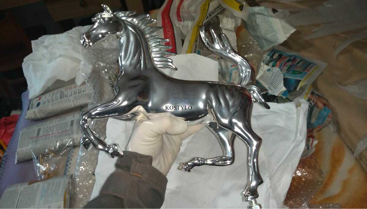 the luxury sculpture of the Ferrari horse has already been silver-plated and is waiting for final assembly with the base in the shape of the emblem and with unique striped flint, all handcrafted at the Kostylo atelier