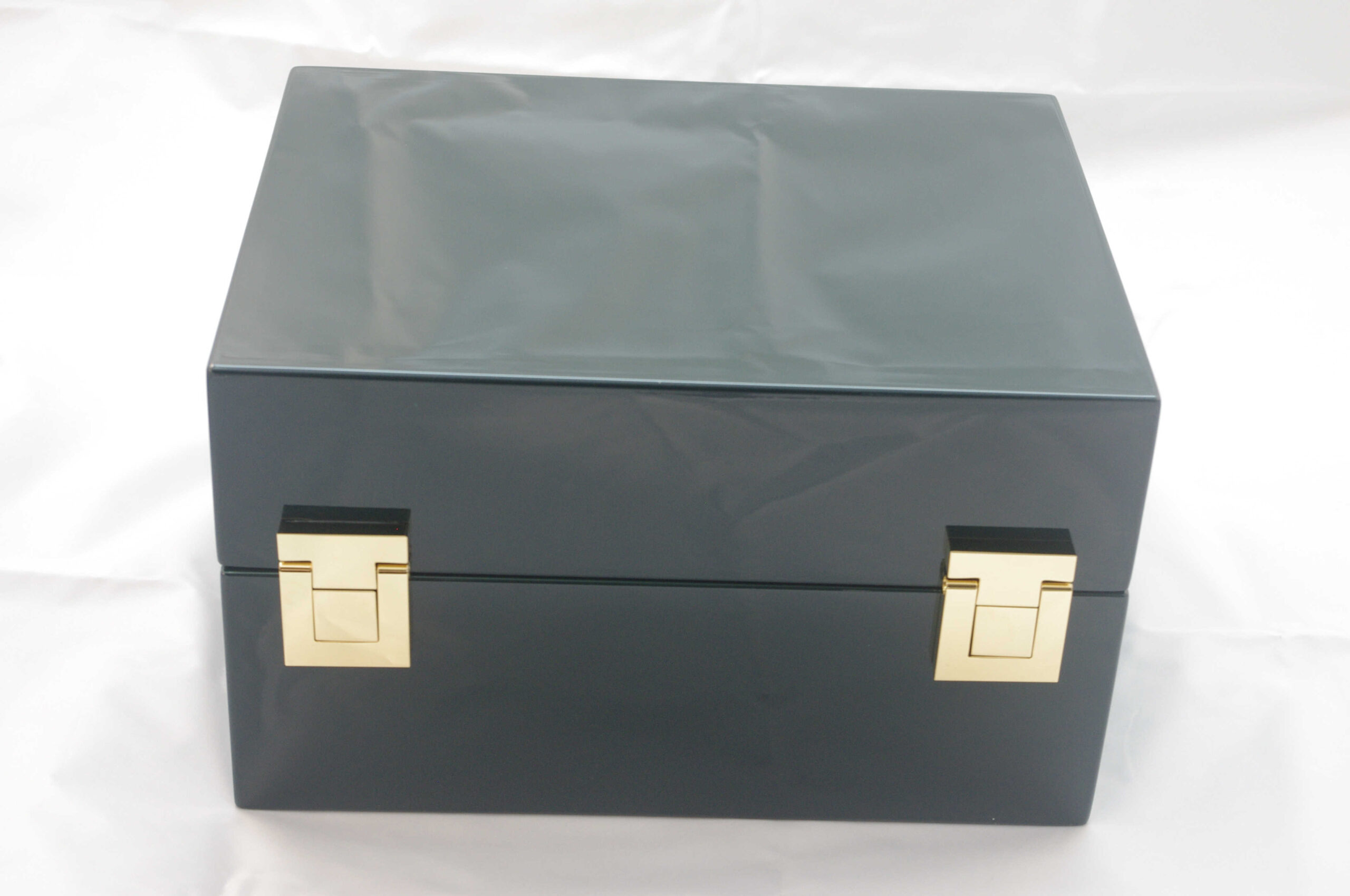 luxurious corporate dark green box with gold latches for a luxury tsarist box designed and handcrafted Kostylo atelier