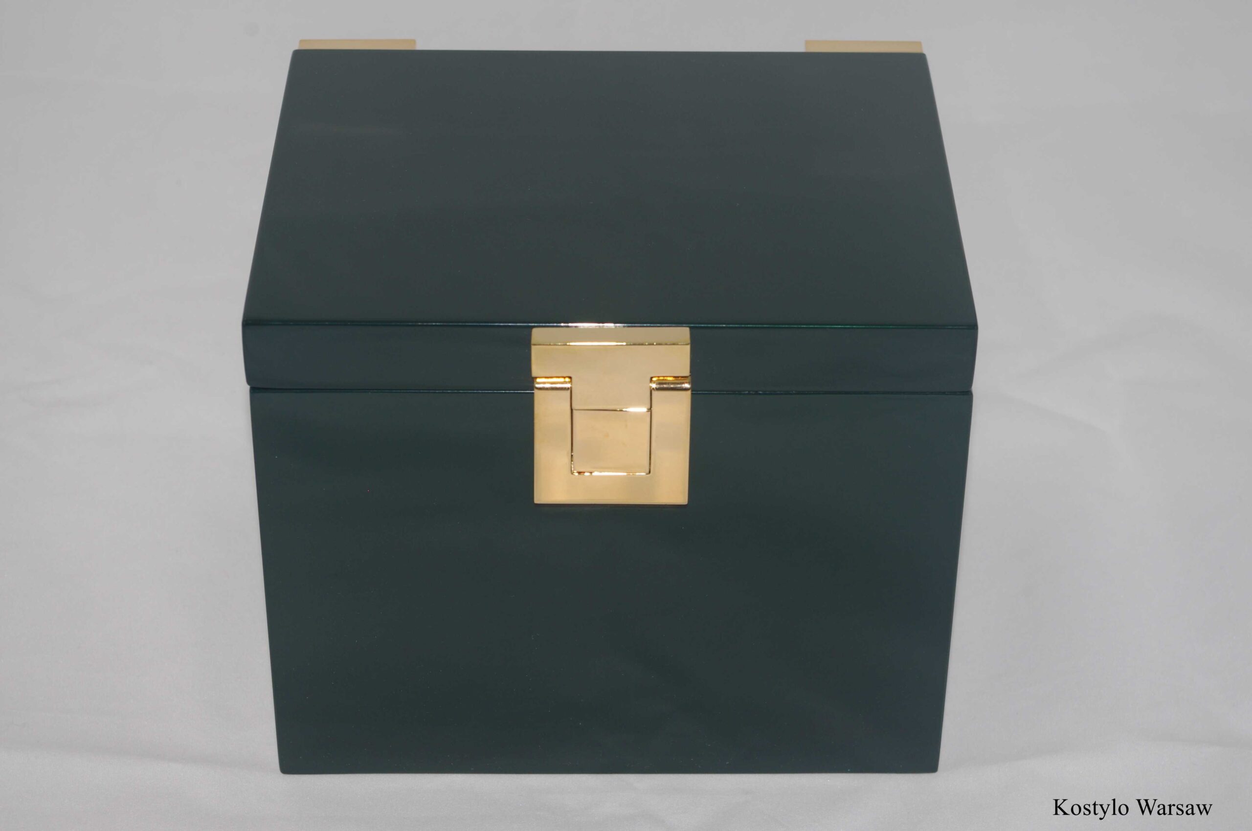 luxurious_dark_green_packaging_with_satin_for_kostylo_atelier_works Luxurious dark green packaging lined with satin inside with handmade gold-plated clasp by Kostylo atelier