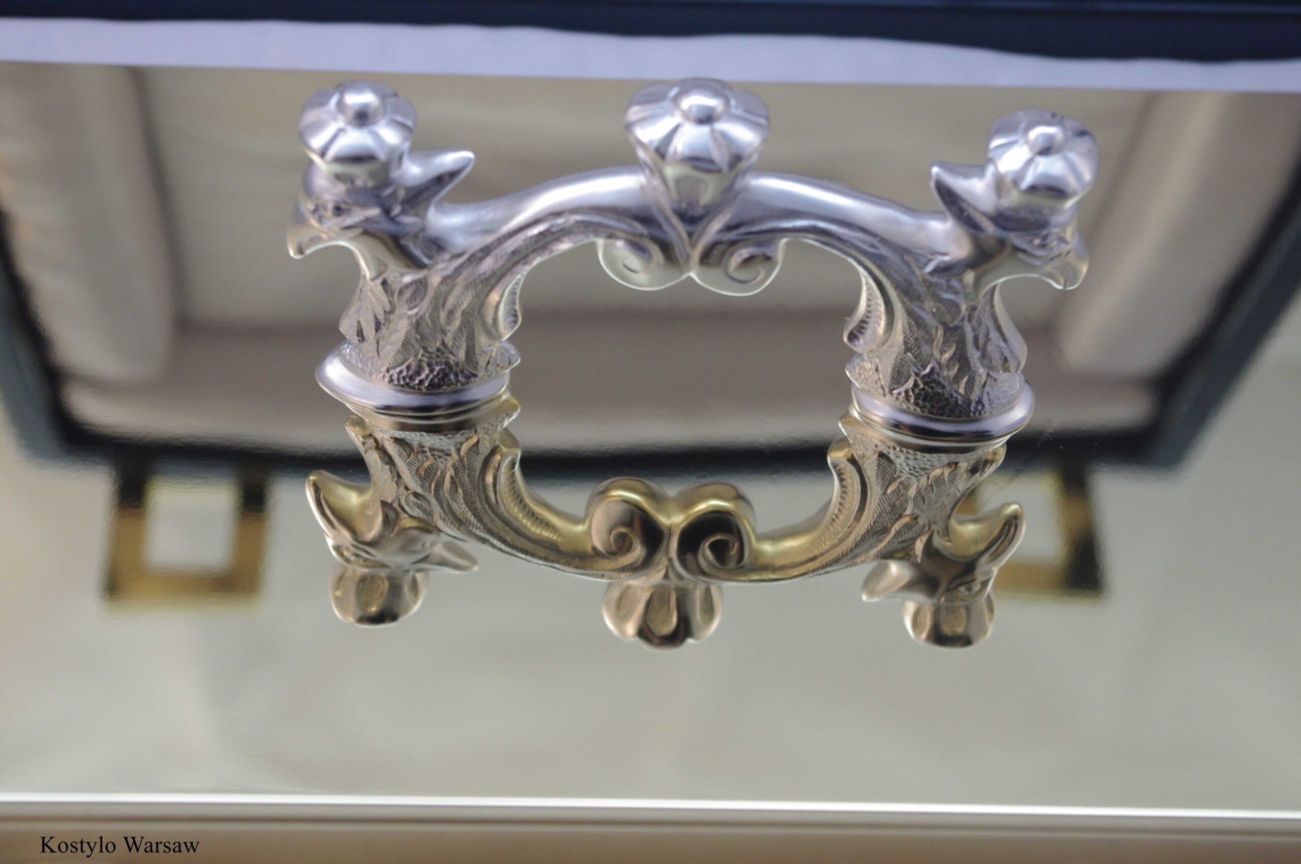 luxury handcrafted silverplated detail of the tsar's handle in the shape of the unique tsar's double-headed eagle by kostylo atelier