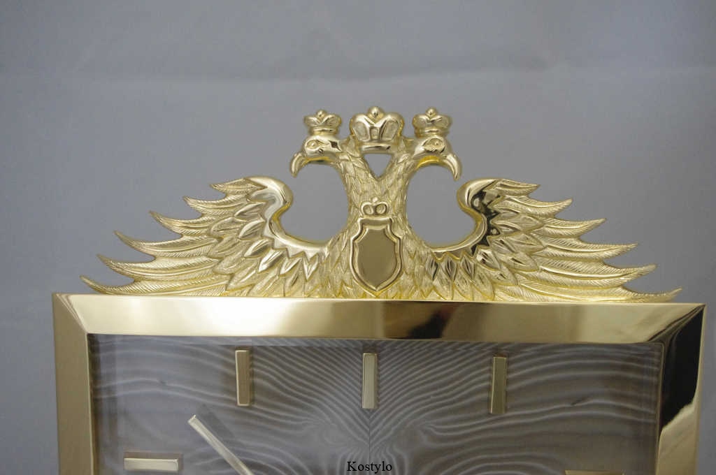 luxury_best_tsarist_double_eagle_wall_clock_by_goldsmith_kostylo_atelier very rare design of a gold-plated wall clock with an imperial eagle, featuring high-quality striped flint, as well as tempered and engraved glass