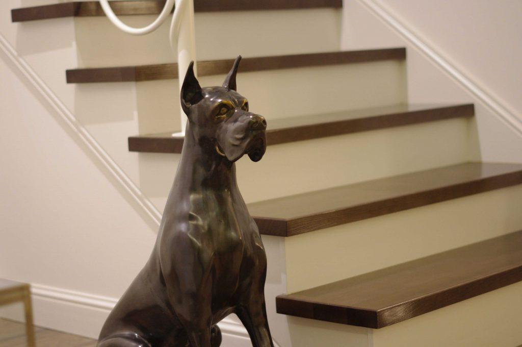 luxury_sculpture_of_german_great_dane_dog_by_kostylo_atelier extraordinary life-size sculpture of a German Great Dane dog, a luxurious masterpiece by the elegant stairs by kostylo atelier