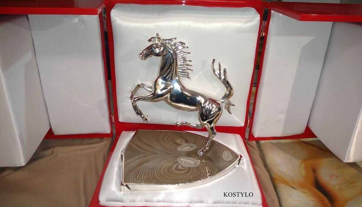 luxury_silverplated_horse_sculpture_ferrari_authored_kostylo_atelier very luxurious unique figure sculpture of Ferrari horse with striped flint base in company packaging hancrafted Kostylo Atelier