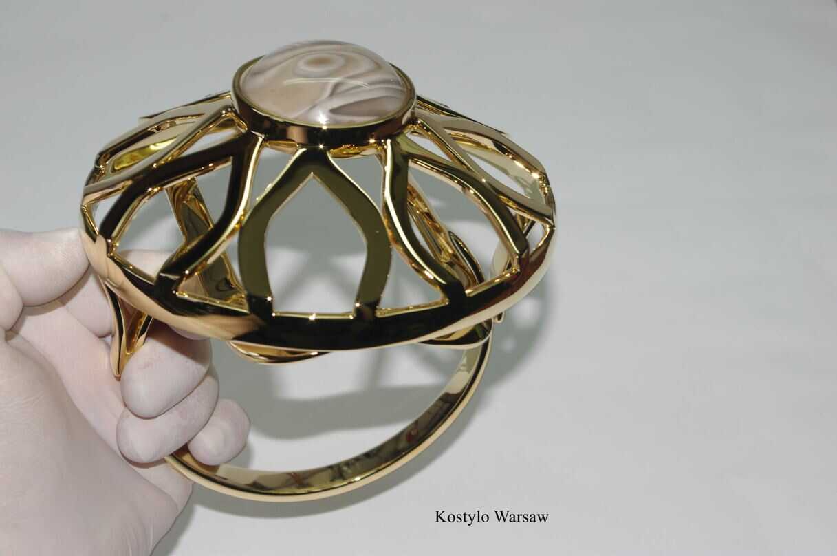 modern style of gilded lotus flower sculpture with large striped flint in the middle handcrafted designed by Kostylo