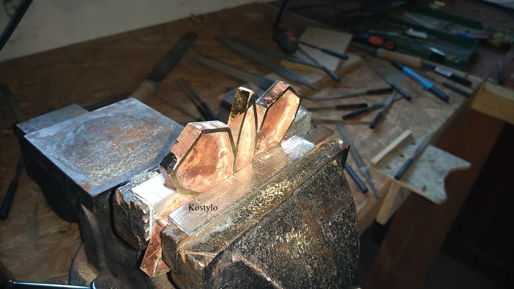 Luxury European Style Trouser Buckle with Hand-Grinded Butterfly Precise hand-sanding of excess silver solder and smoothing of all sides and angles of the butterfly bas-relief for a luxury gold-gilded belt buckle by Kostylo atelier