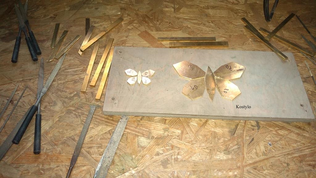 Luxury Gold-Plated European Style Butterfly Trouser Buckle Very precisely hand-cut bottom elements from brass sheets to connect all parts forming the large butterfly bas-relief for a luxury belt buckle by Kostylo atelier