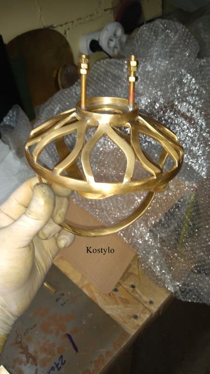 The lotus flower sculpture is silver-soldered hand-filed and smoothed with sandpaper, prepared for copper plating at Kostylo atelier