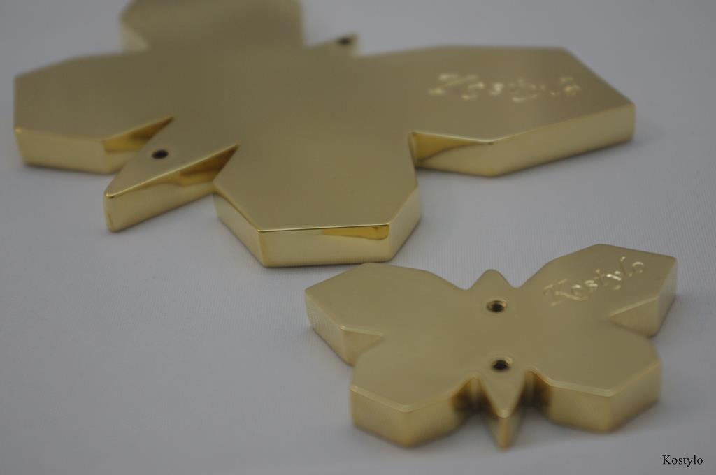 Final appearance of the back of the butterfly bas-relief gilded in 23-karat Italian gold with hand-engraved Kostylo atelier logo