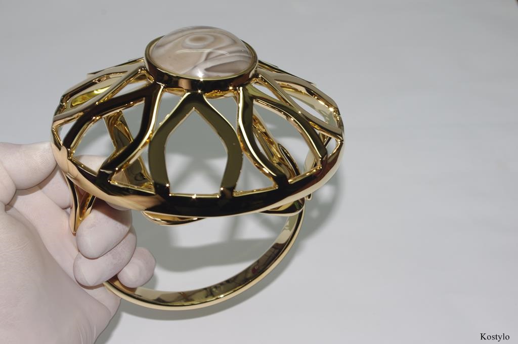 Final appearance of the luxurious 23-karat gold-gilded ring sculpture depicting lotus flower in modern style by Kostylo atelier