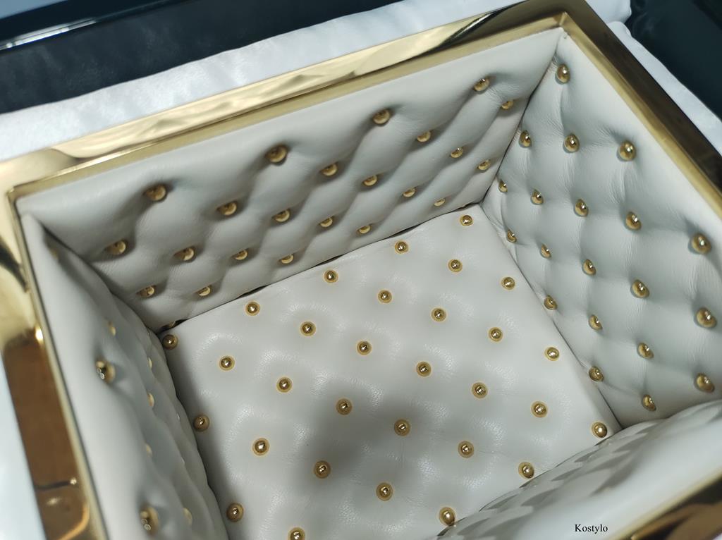Interior of luxurious 23-carat gold-gilded jewelry box with gilded quilting and high-quality white natural leather made at Kostylo atelier