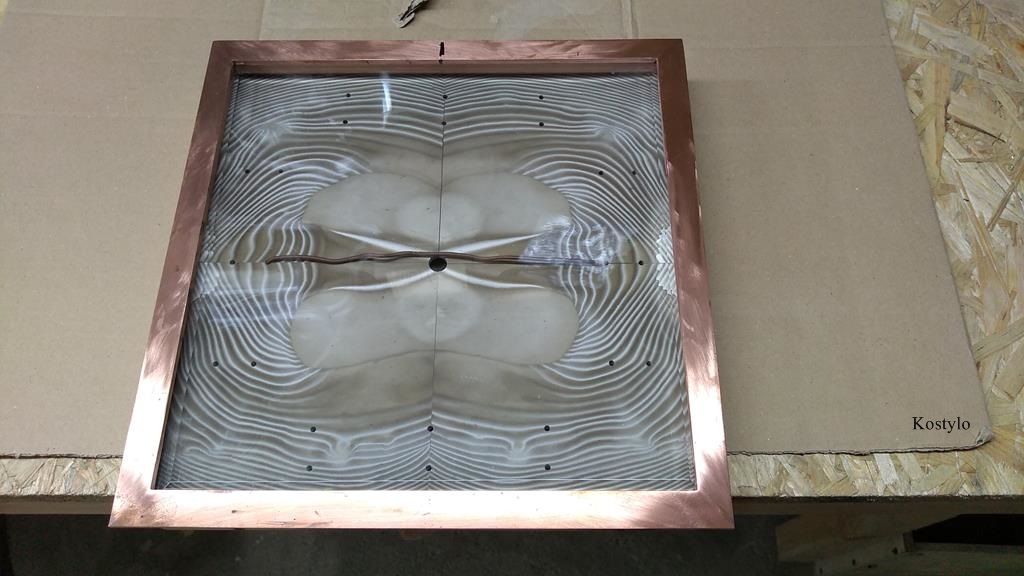 Copper-plated wall clock casing hand-smoothed with sandpaper during the fitting of clock dial made of semi-precious striped flint stone by Kostylo atelier