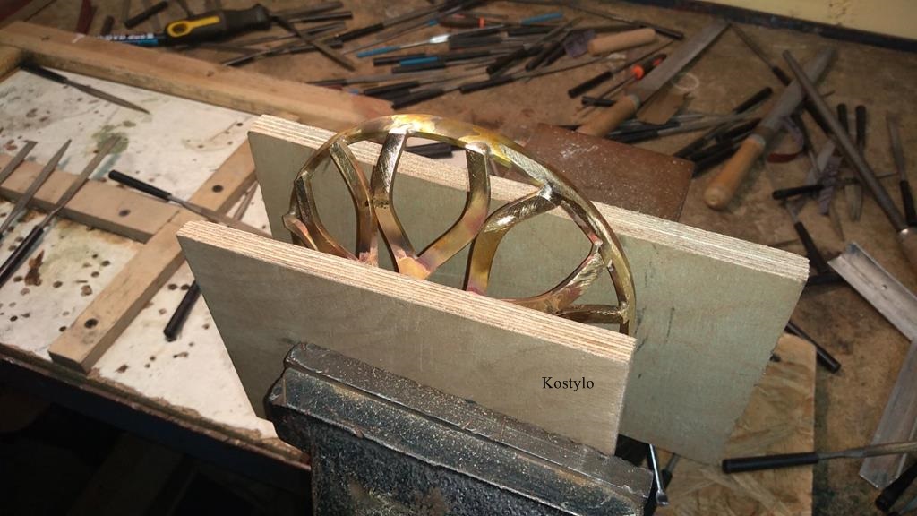 After silver soldering the details into single piece the resulting crown is hand-filed to remove excess solder and smoothed with sandpaper by Kostylo atelier